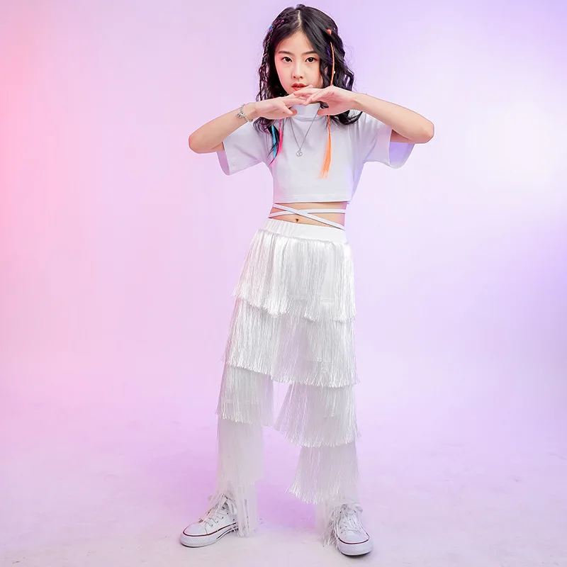 

Children Kpop Hip Hop Clothing White Lace Up Crop Top T Shirt Tasseled Fringed Pants for Girls Jazz Dance Wear Costumes Clothes
