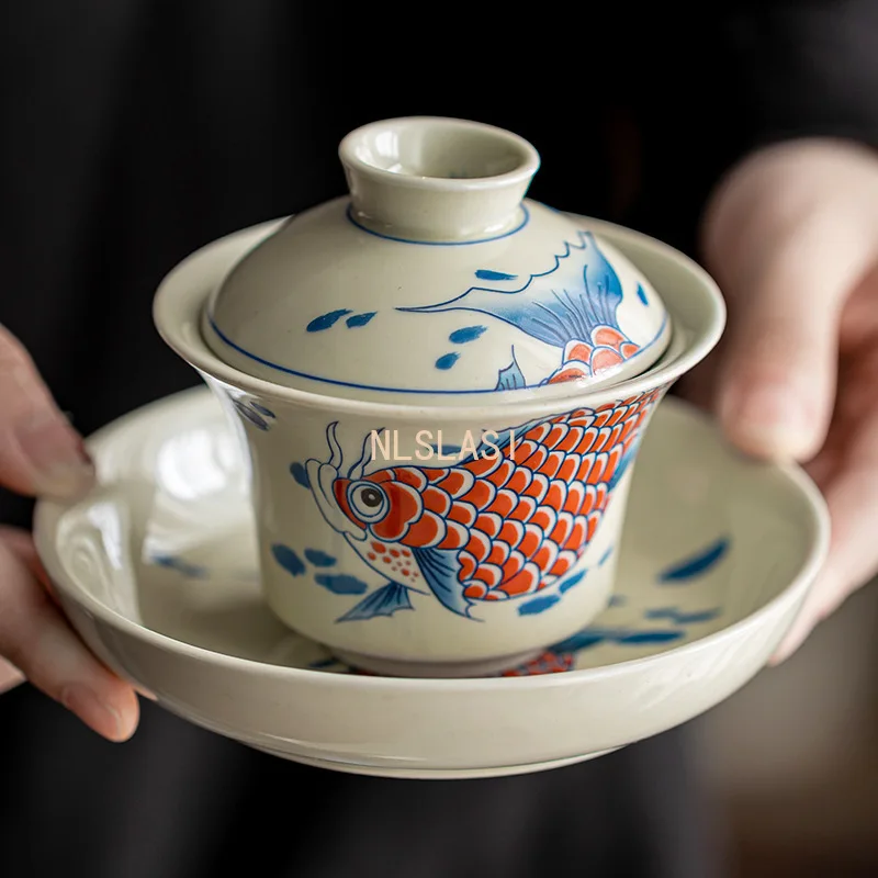 طقم شاي صيني طقم شاي سيراميك منزلي وعاء مغطى بالأسماك الذهبية أدوات شرب المطبخ سيراميك كونغ فو ، طقم شاي Pu Erh