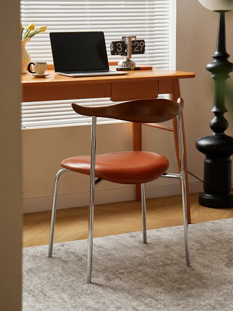 Stylish Brown Leather Chair with Wooden Horn-Shaped Back : A Retro-Modern and Elegant Accent Seat for Home Offices