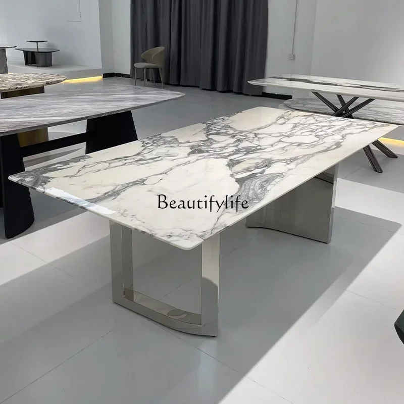 Nieuwe stijl Nieuwe Franse witte geïmporteerde natuurlijke marmeren eettafel, eenvoudige high-end lichte luxe grote bloem witte luxe stenen din