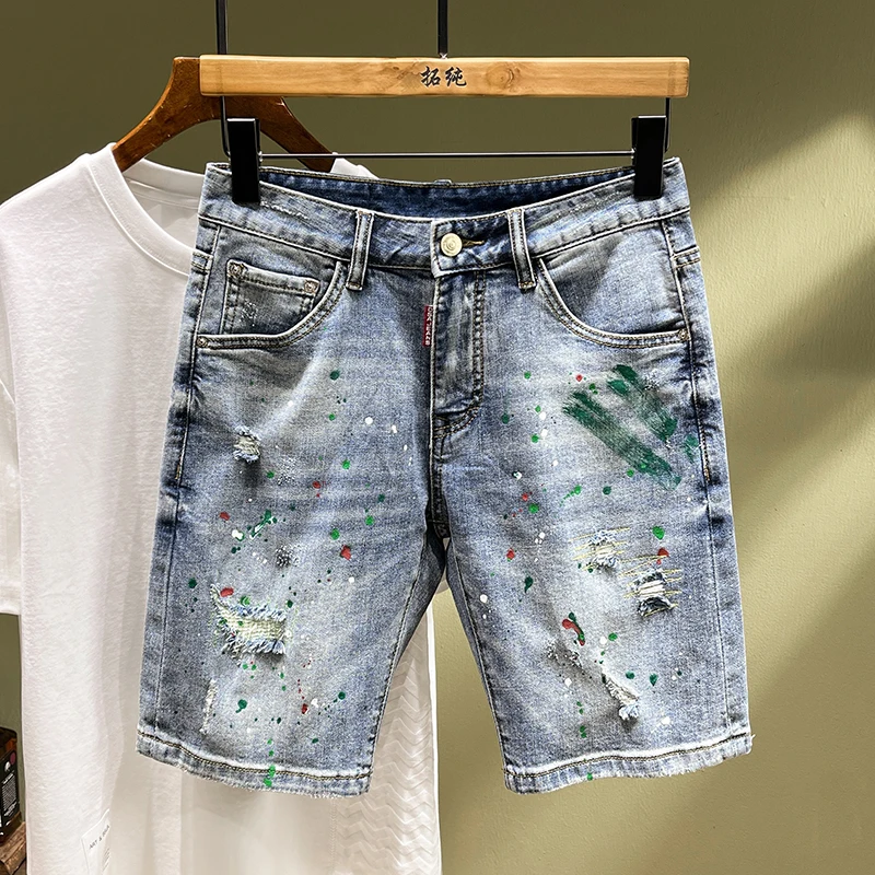 

TC263 Summer new tide brand jeans men's spray-painted holes elastic fashion versatile Slim Chinese pants