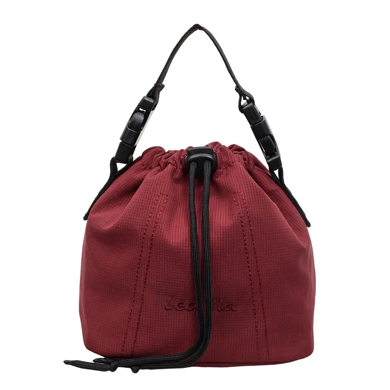 Women's Black Nylon Drawstring Bucket Bag with Adjustable Strap and Logo Detail Minimalist Crossbody Sling Purse for Daily view 6