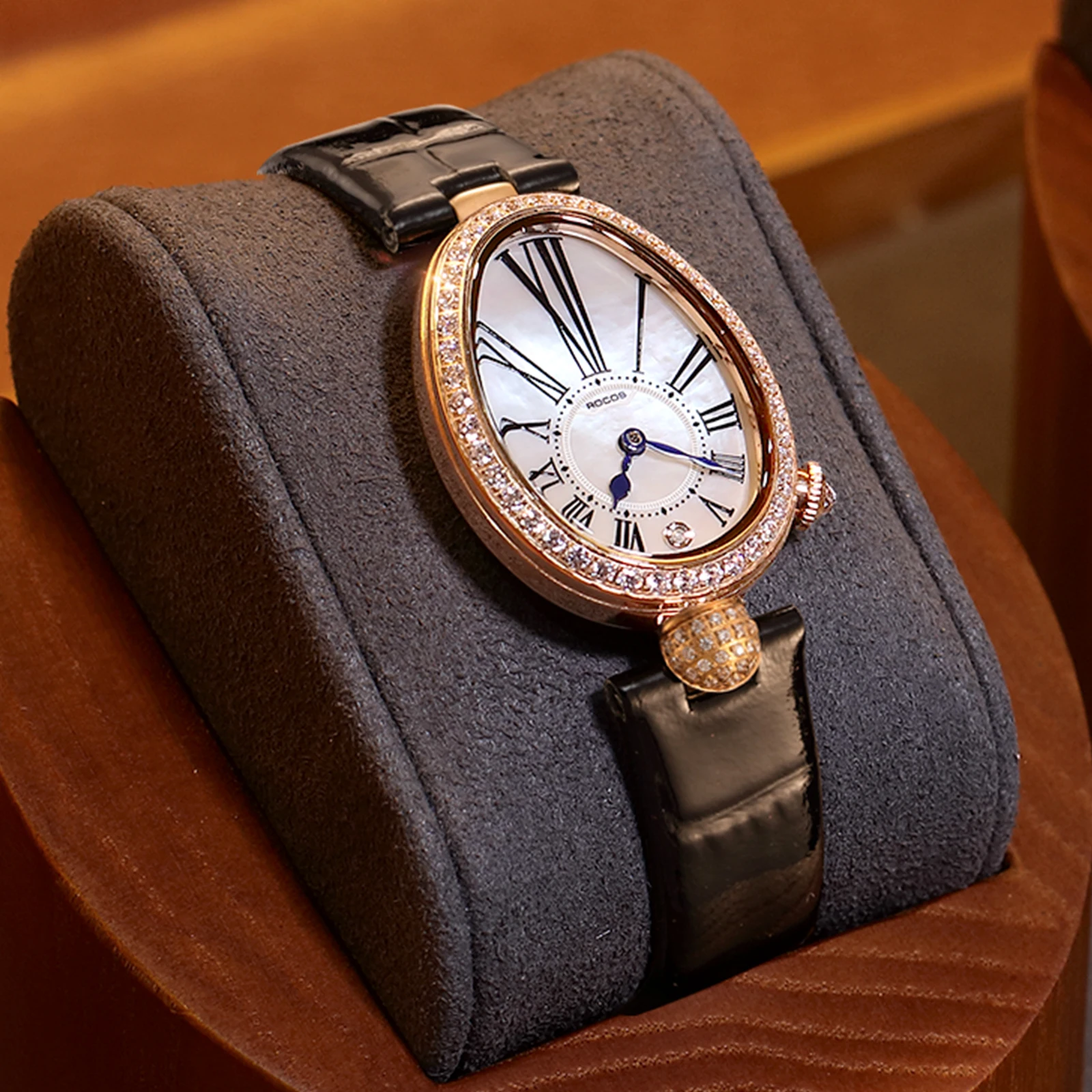 ROCOS Montre Femme Vintage de Luxe Haute Qualité Tendance Ovale Chiffres Romains Irréguliers pour Femme R0233