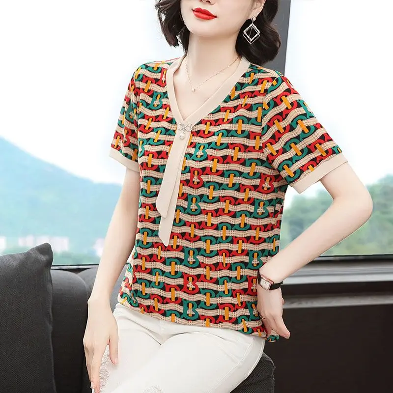 Women's Clothing Short Sleeve Fashion Loose Printed T-shirt 2023 Summer New Casual All-match Elegant V-Neck Spliced Female Tops