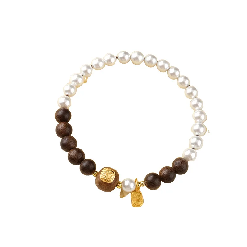 

Nine Points Sinking Qinan Agarwood & Zaki Lama Sandalwood Shell Bead Bracelet for Women Gifts