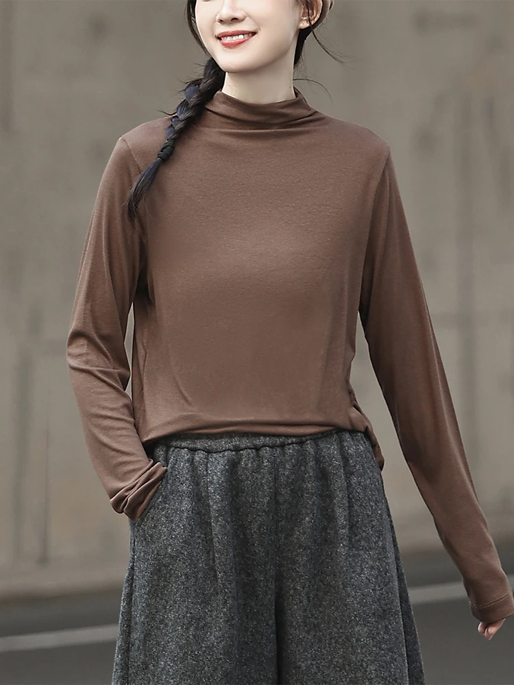 

Женская базовая футболка с высоким воротником и длинными рукавами, низкой насыщенностью цвета, высокой эластичностью, можно носить как самостоятельную вещь, простой крой, хлопок.