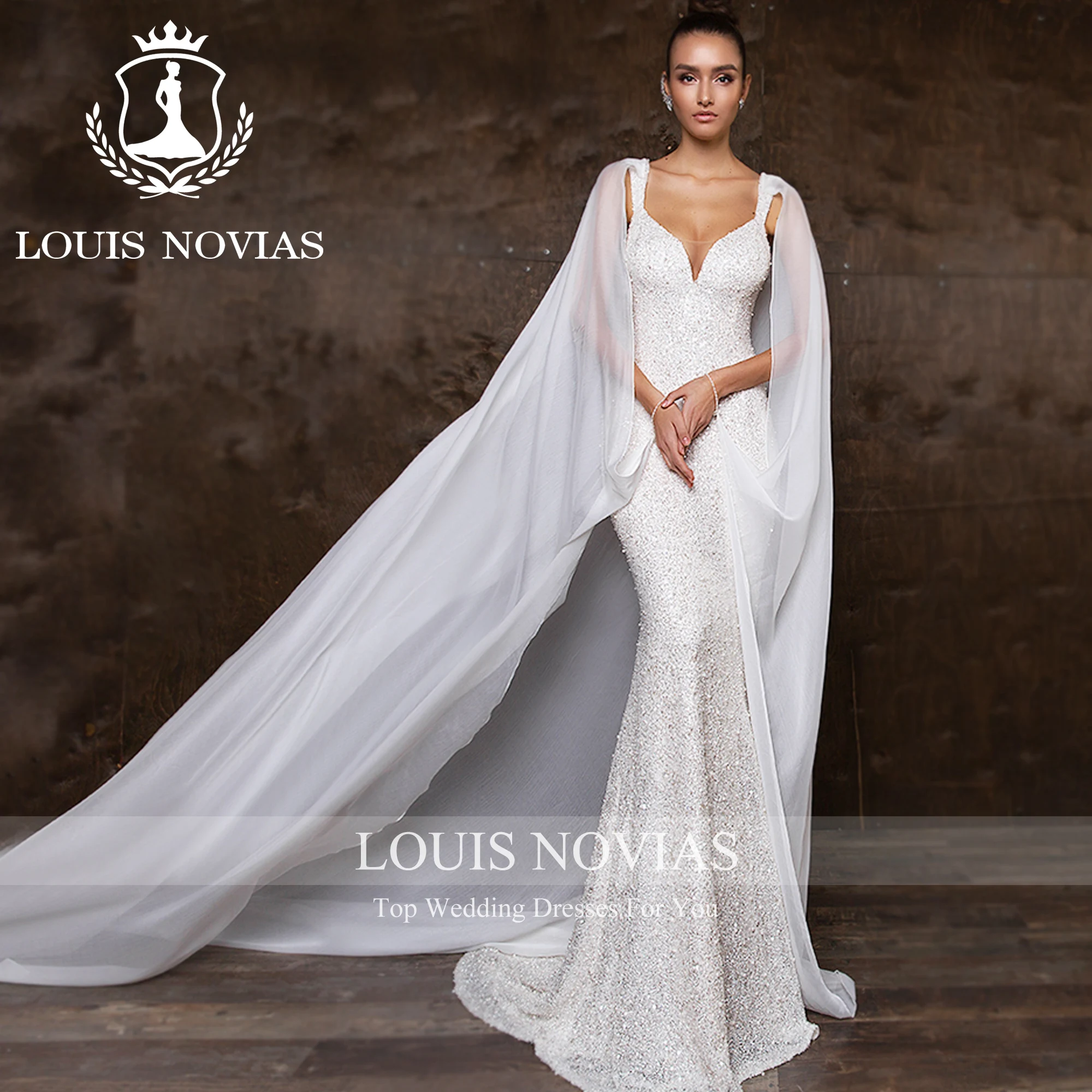 ルイノビアのウェディングドレスマーメイドスタイルスパゲッティストラップミットケープクリスタルグリッターウェディングドレス Vestidos デノビア