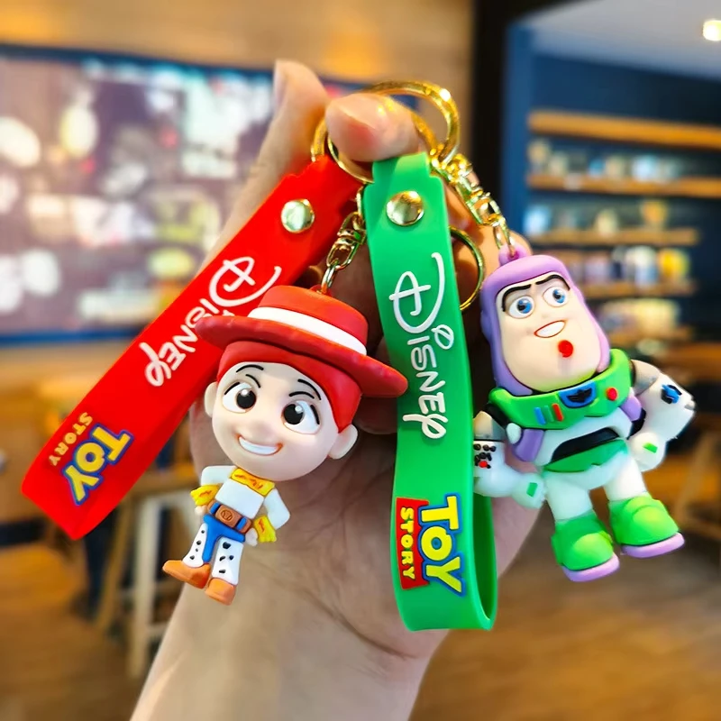 

Disney Keychain Cartoon Anime Toy Story Doll Keychain Three Eyed Boy Buzz Lightyear Strawberry Bear Bag Pendant Kids Toys Gifts