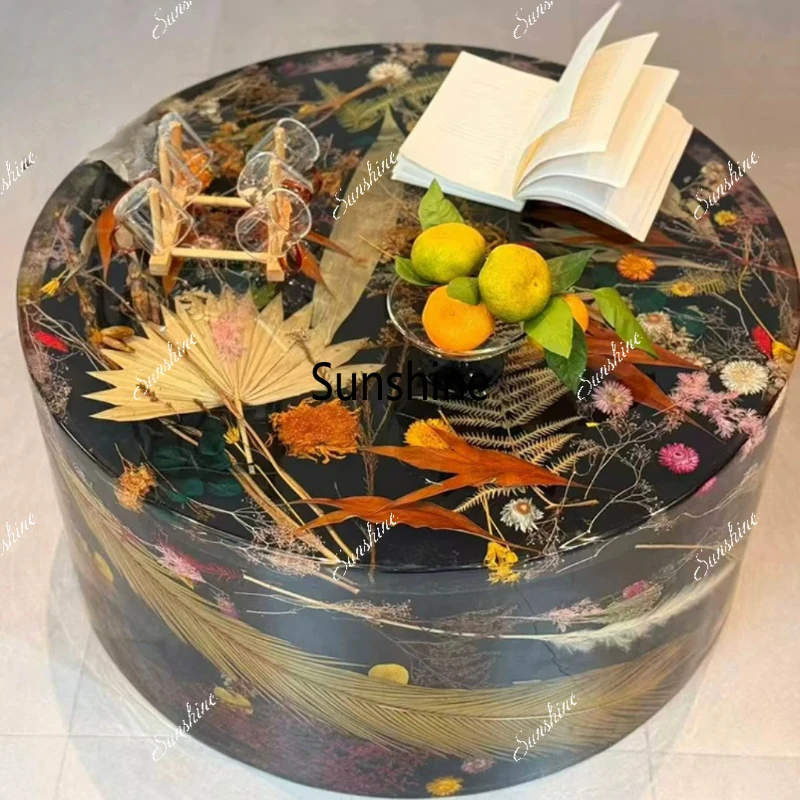 

Light luxury high-end sense round high-end art resin coffee table