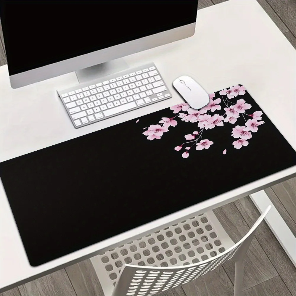 

The pink cherry blossom mouse pad is made of anti-slip rubber, durable and washable, suitable for both office and home use