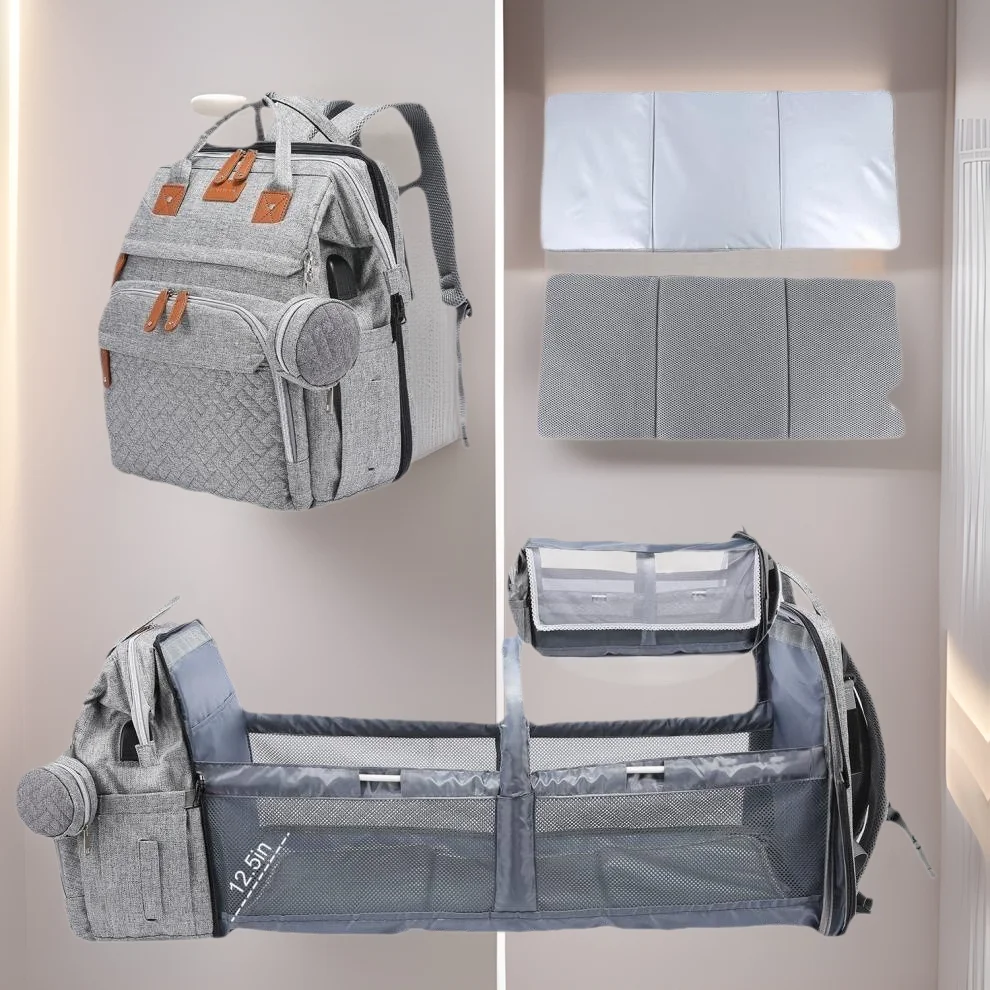 أكياس الحفاضات حقيبة الأم الأعلى الأكثر مبيعًا مع سرير هزاز للأطفال وتصميم مقصورة حقيبة الأم نزهة الطفل