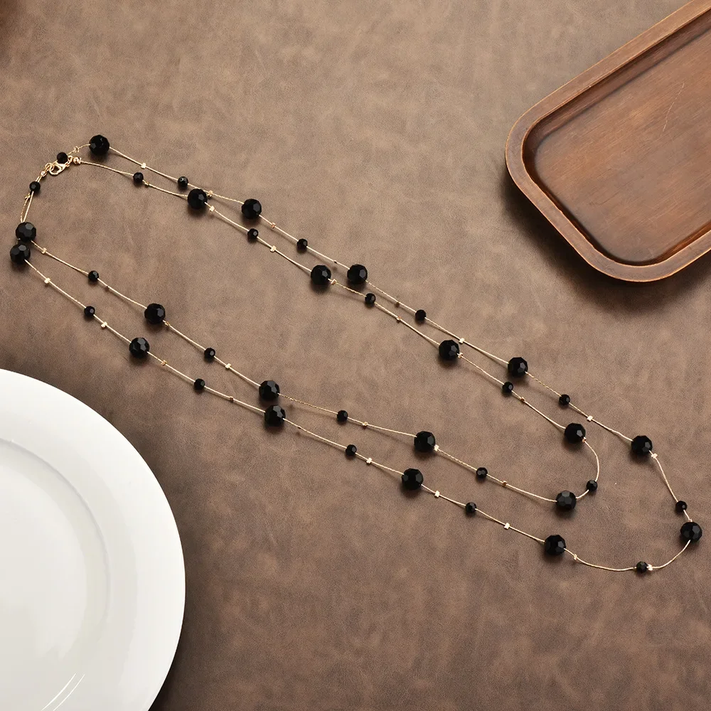 

A 2025 fashionable and elegant crystal bead sweater chain, a necklace that suits mom's dressing style