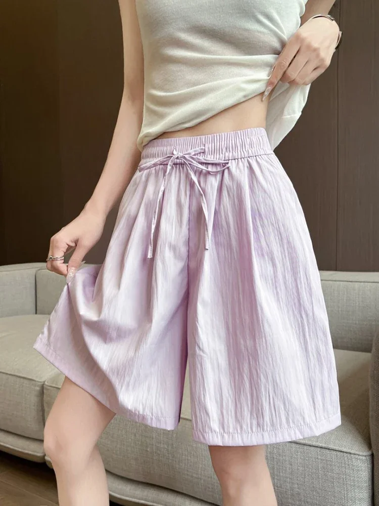 Pantaloncini al ginocchio stile college pop Vita elastica sottile Protezione solare estiva Pantaloni capri corti a gamba larga per le donne