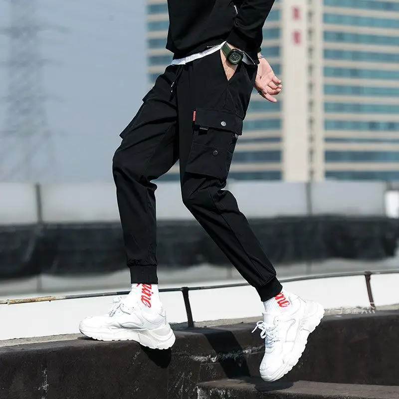 

Pantalones Cargo informales de Color sólido con múltiples bolsillos, cintura elástica de tiro medio, puños retráctiles con cord