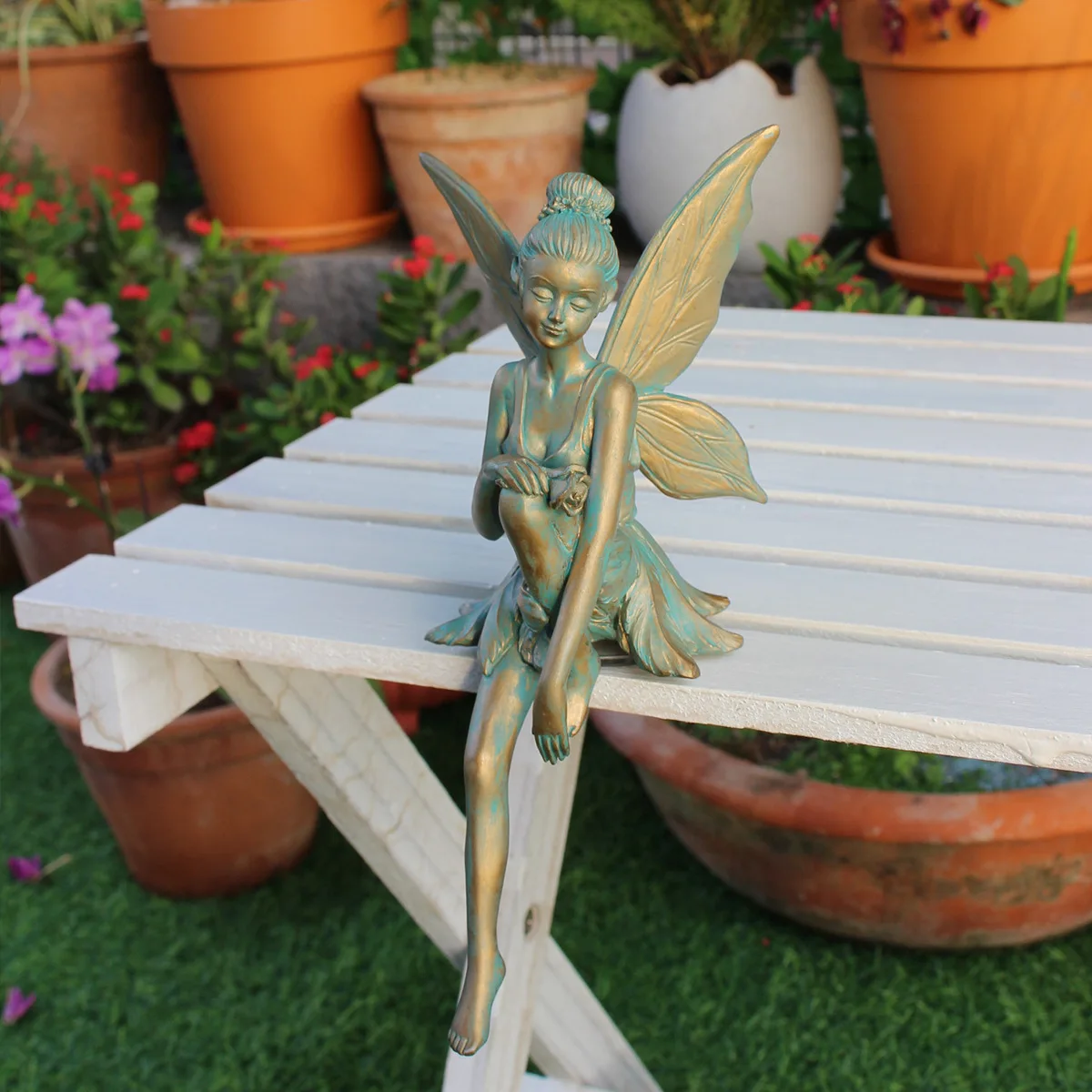 

‌ Бронзовая цветочная фея - статуя крылатой смолы для декора сада и патио