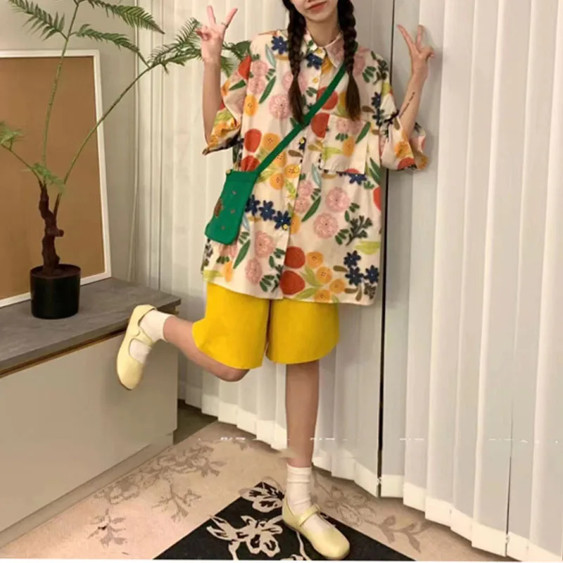 Camiseta de manga corta con bolsillos y botones para mujer, camisa holgada informal con estampado sencillo, estilo de vacaciones, novedad de verano