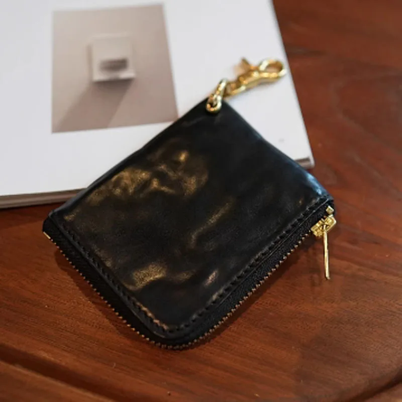 AETOO Handcrafted retro aged vegetable-tanned cowhide portable short coin purse, genuine leather bank card storage small hanging