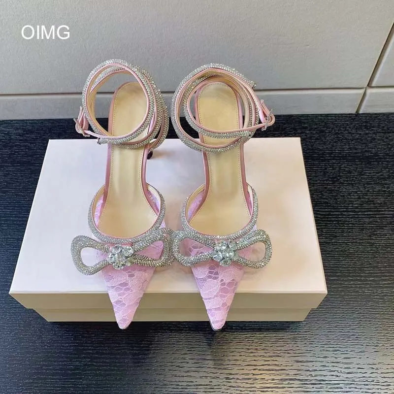 

OIMG Shining Crystal Bowknot Pointed Toe Pumps Women Sexy Stiletto High Heels Wedding Shoes Woman Ankle Strap Summer Sandals