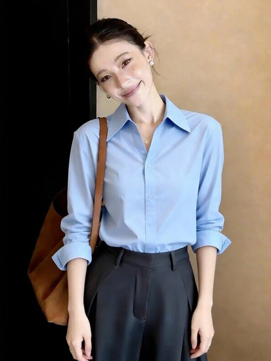 

Элегантная синяя женская рубашка с длинным рукавом свободного кроя для офиса, профессиональный стиль, стройнящий силуэт, из полиэфирного волокна, повседневная одежда