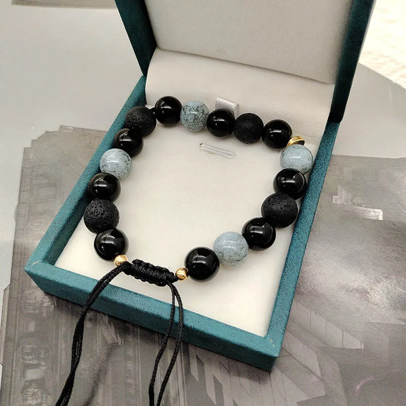 Pulsera tejida con cuentas de piedra, un diseño de nicho con una sensación de alta gama, cordón, pulsera de hilo de cuentas de piedra volcánica