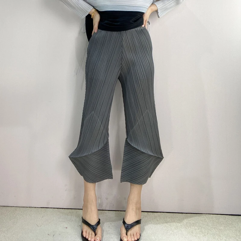 

Woman fashionable pants Miyake Pleated Summer New Solid Loose Irregular design Folds Female Ankle-Length Pants Tide