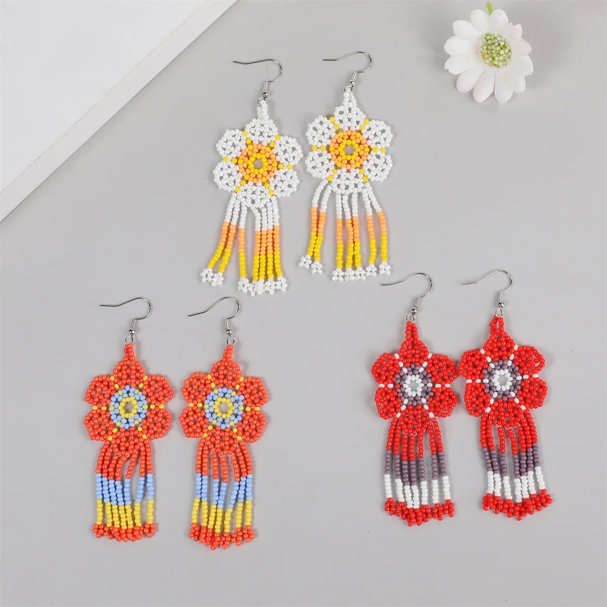 

Beaded earrings Tassel Flowers Graph Hollow out Hand knitting Originality Bohemia Alloy Fashion Simple Rice bead earrings