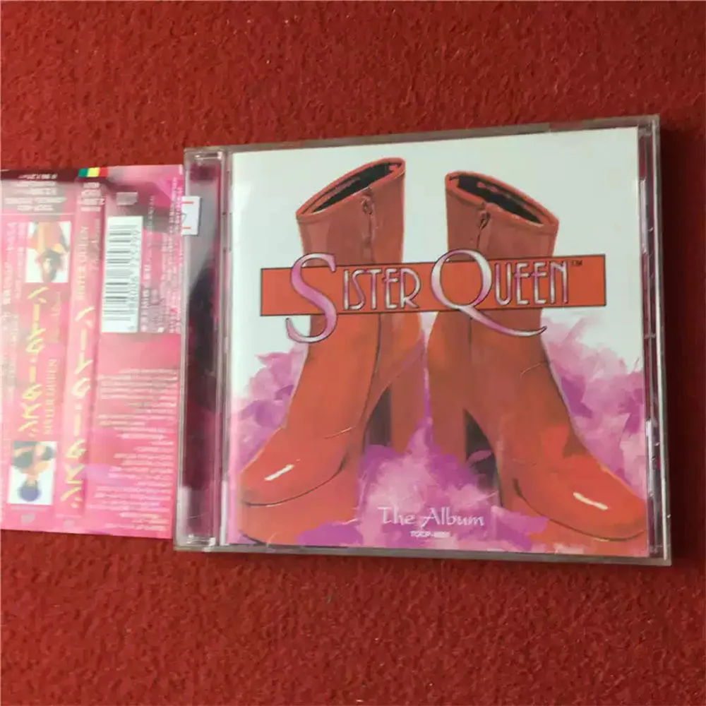 

CD 'The Album' Was Created By The French Group Sister Queen and Released in 1997 By The French Independent Label Elliot Music