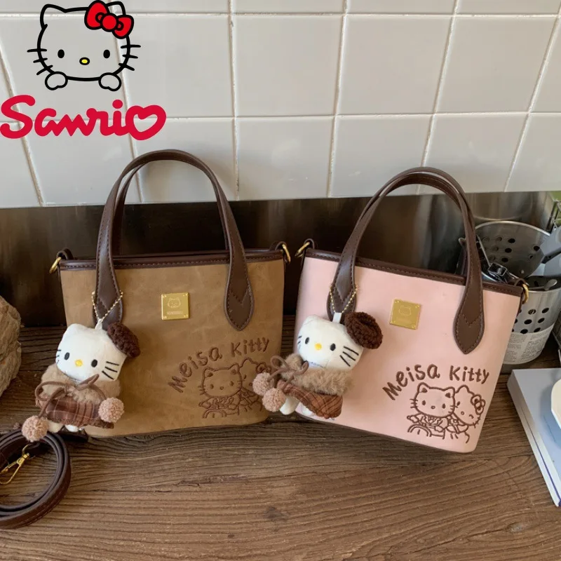 

Hello Kitty 2026 Новая женская сумка, модная высококачественная женская сумка для хранения телефона, универсальная повседневная сумка через плечо с мультяшным принтом для девочек