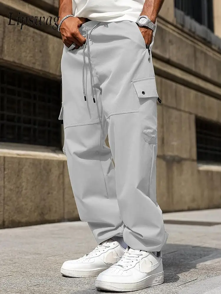 

Модные мужские свободные прямые брюки, уличная одежда, модные однотонные брюки-карго с несколькими карманами для мужчин, уличные повседневные брюки на шнуровке