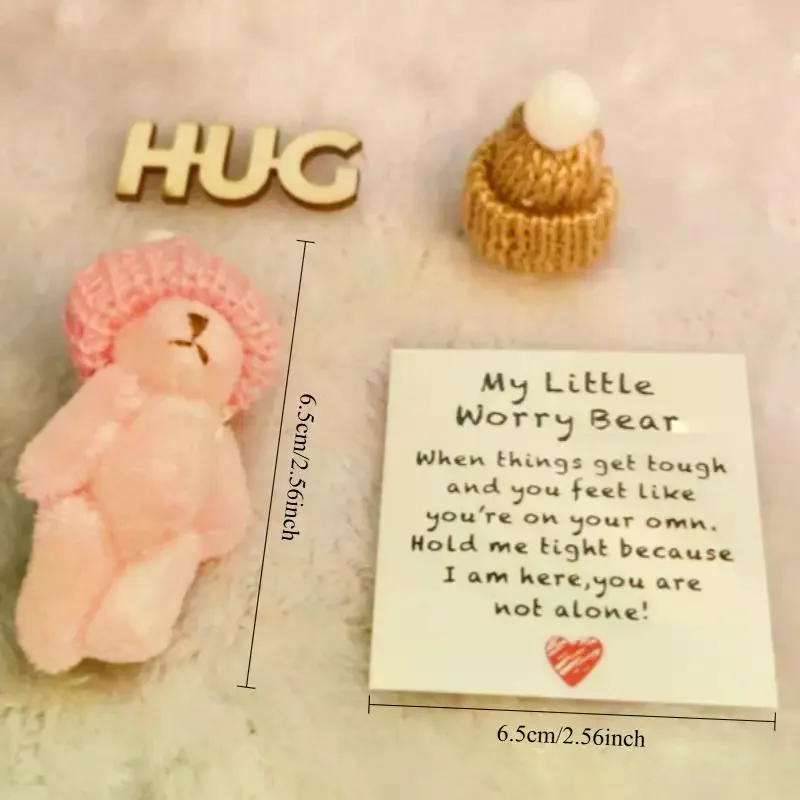 ニット帽とメッシュバッグ付きのミニぬいぐるみ、ピンクのリボン付きで完璧なクリスマスプレゼント