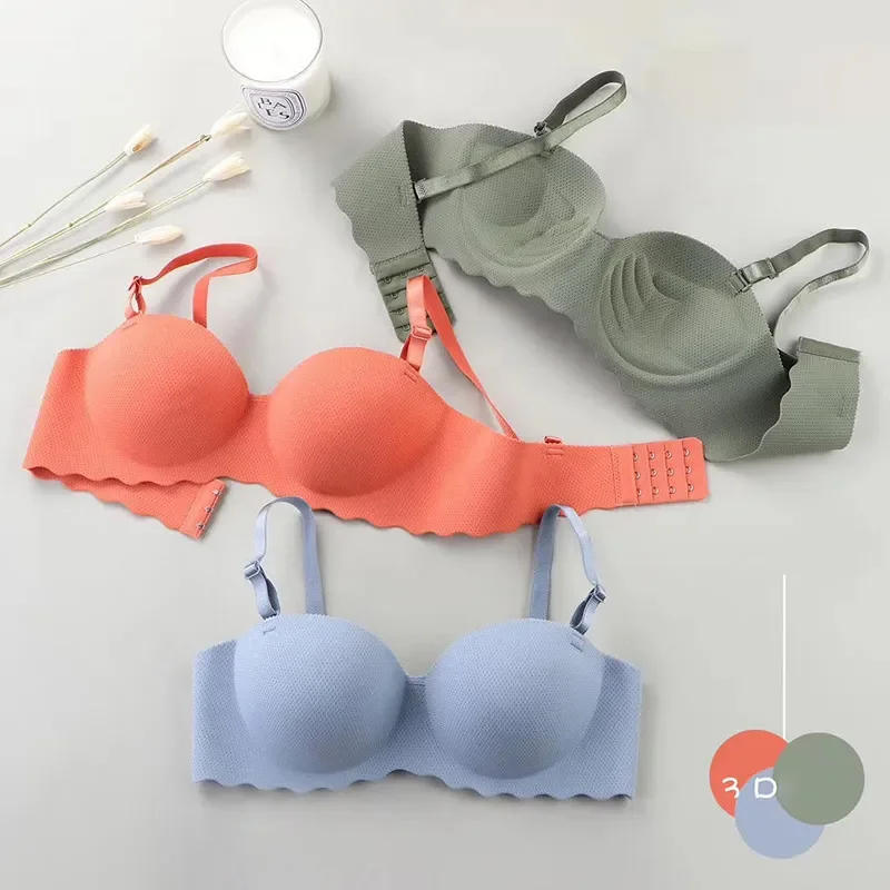 Sujetadores sexys de realce para mujer, ropa interior sin costuras, lencería inalámbrica de Color sólido, sujetador de tirantes convertibles de una