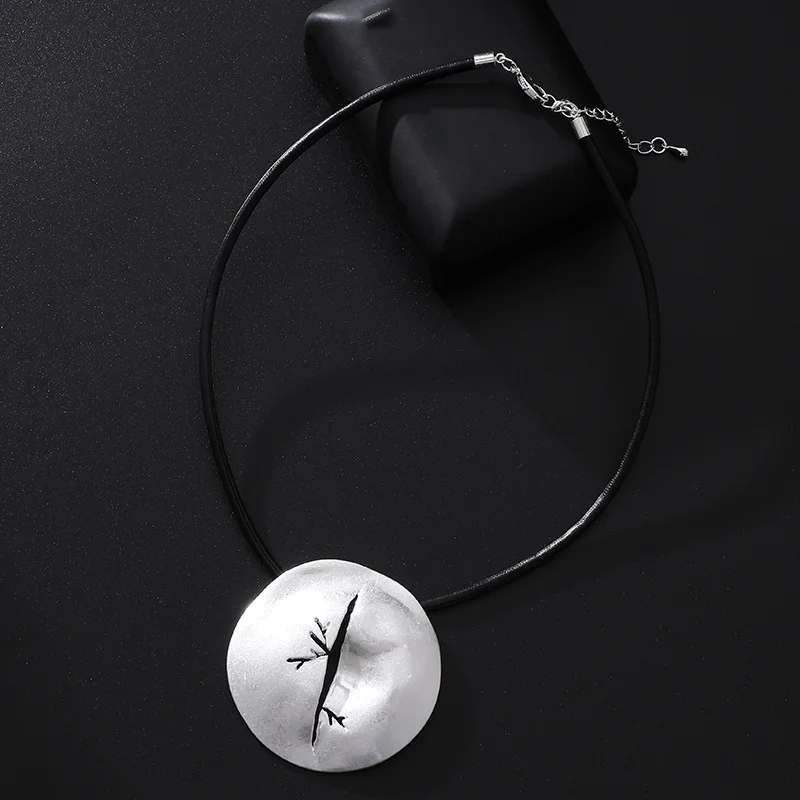 Foreign trade special for popular European and American personality hollow design irregular round geometric alloy pendant women'