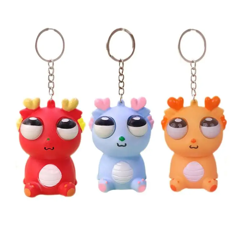 

Big Eyeball Pinch Keychain Cartoon Couple Pop Eyes Dinosaur Dragon Keychain Stress Relief Keychain Toys Cute Dragon Mochi Toy