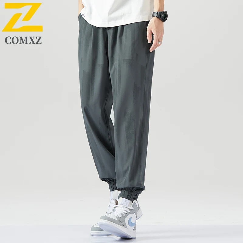 

Мужские повседневные брюки из ледяного шелка, летние быстросохнущие дышащие свободные спортивные шаровары с эластичной резинкой на талии, уличные брюки для бега и фитнеса