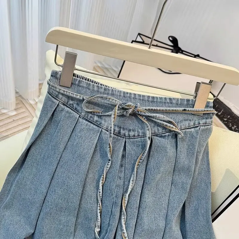 Gonna di jeans con lacci retrò per le donne Autunno a vita alta Gonna a pieghe di media lunghezza Temperamento Gonna a ombrello a trapezio con orlo largo