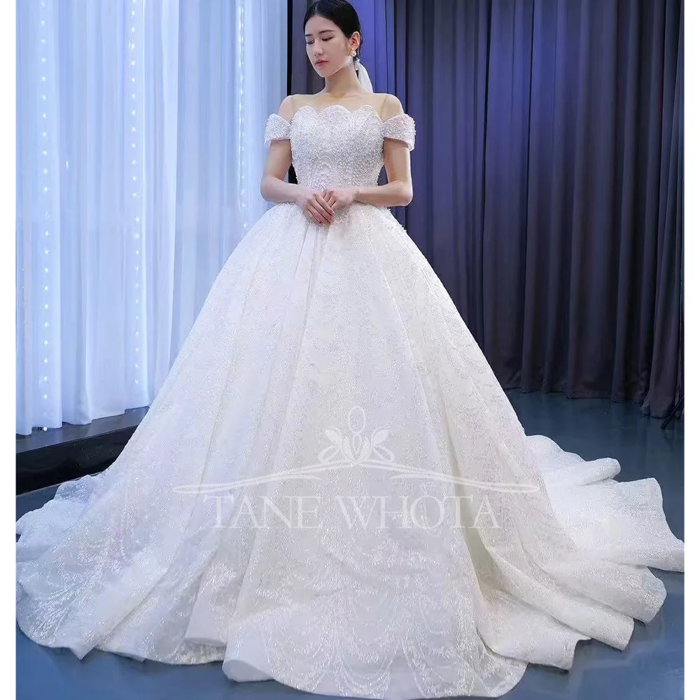 

Luxury Sexy O-Neck Off-Shoulder Bridal Dress With Lace-Up Back And Sequined Beading Customizable Wedding Dress