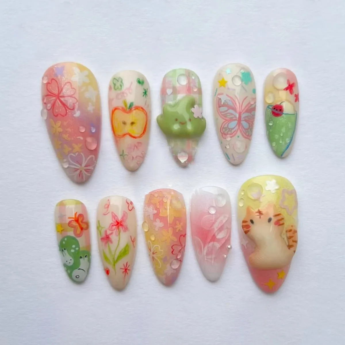 

24PCS Colorful Almond Press on Nails with Ins Buttefly Flowers Cartoon Cat Patterns Fake Nails for Girls Women Wearable Manicure