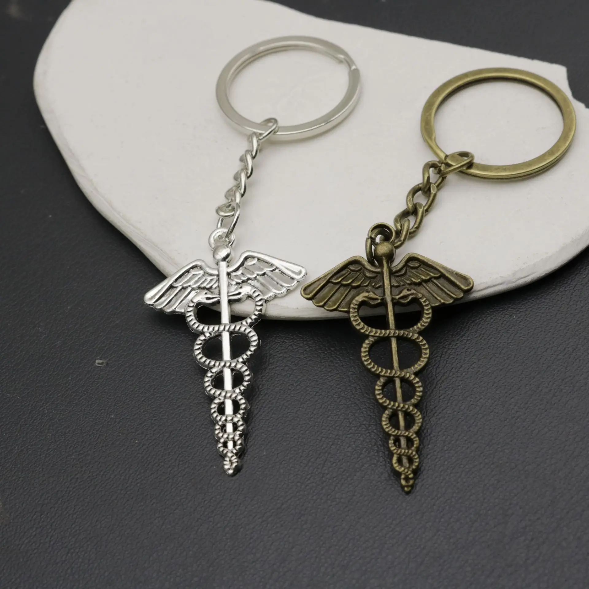 2024 Hot selling Jewelry Simple Double Snake Cane Medical Symbol Car Keychain Pendant