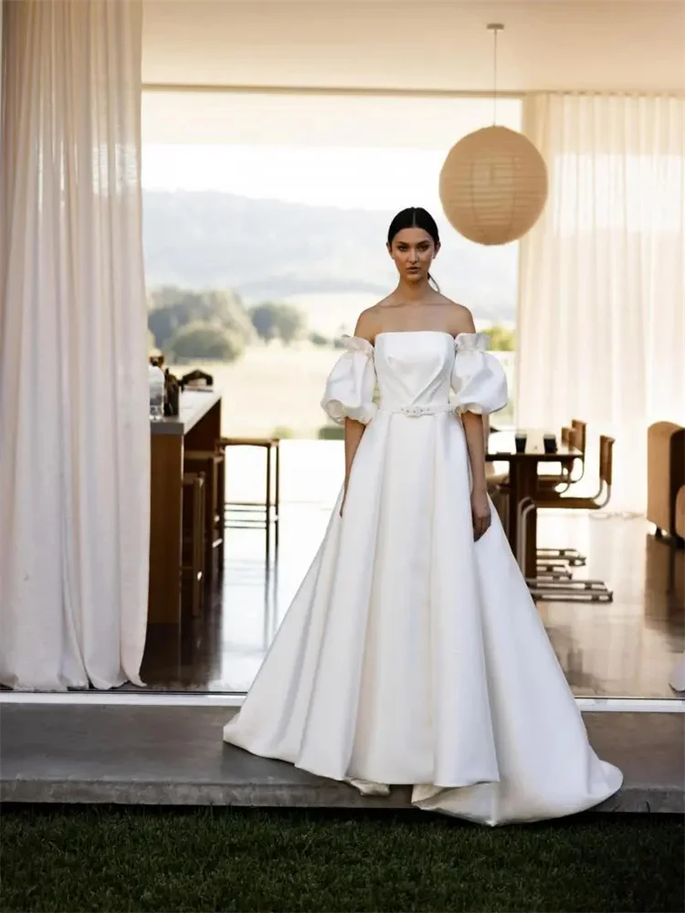 Vestido de novia personalizado sin tirantes, escote, mangas abullonadas, corte en A, con cordones en la espalda y lazo hasta el suelo, vestido de cola Lindy para novia