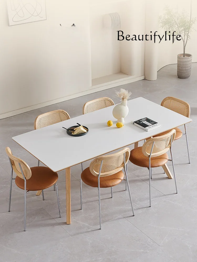 

Nordic wabi-sandy wind solid wood rock slab dining table Japanese cream wind small apartment rectangular dining table