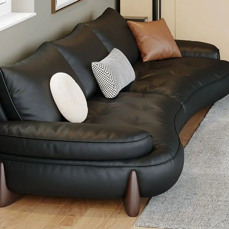 The first floor curved sofa, large and small apartment living room decoration combination designer retro style sofa leather art