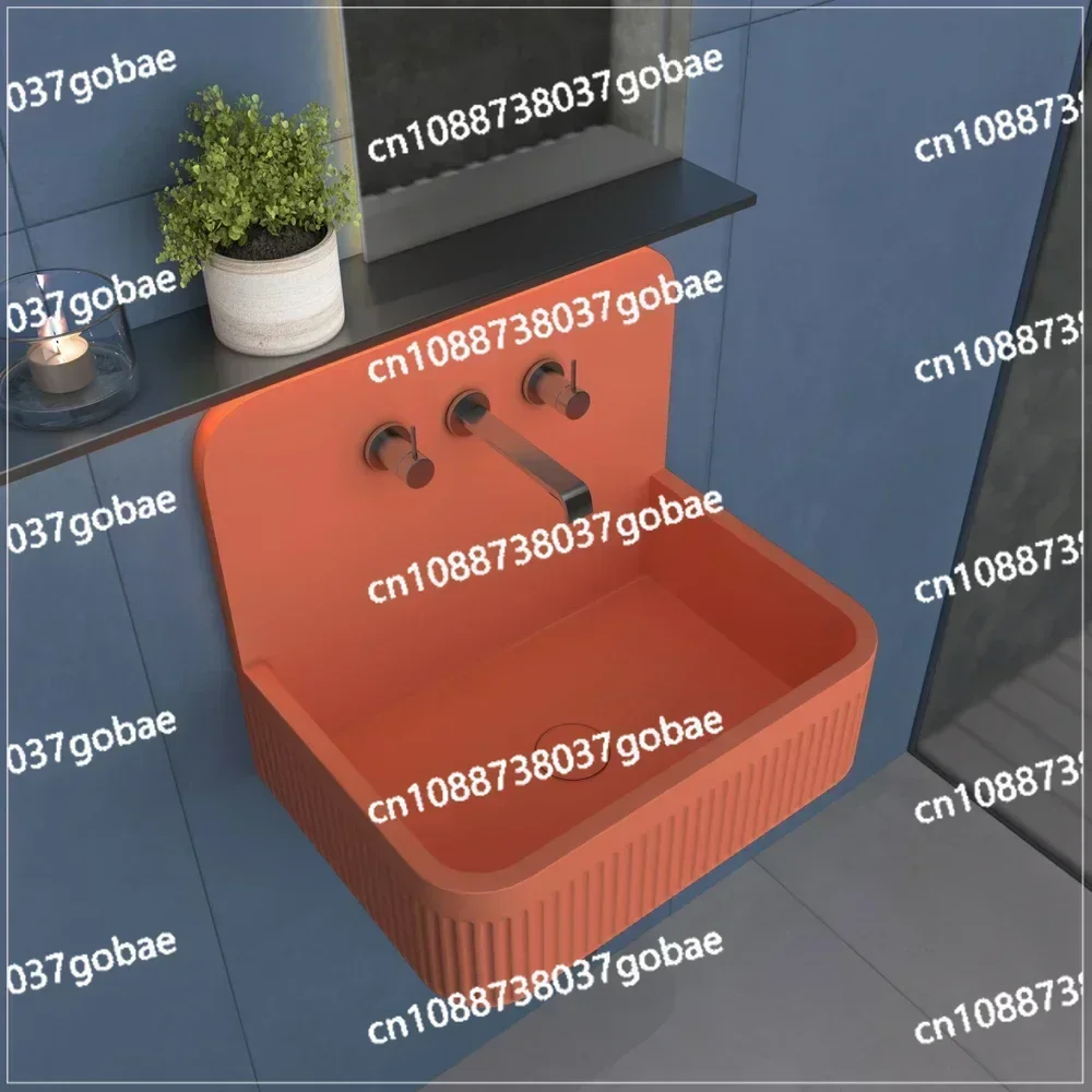 Rectangular concrete sink, orange bathroom, modern sink, bathroom, concrete wall, large grid basin