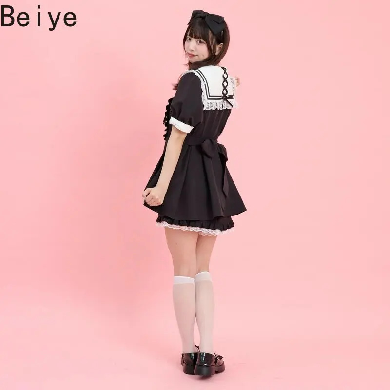 Conjunto de dos piezas de vestido y pantalones cortos estilo Lolita de Jirai Kei para mujer, con cuello marinero, mangas abullonadas, traje corto, detalles de encaje, botones con forma de corazón, atuendo kawaii.