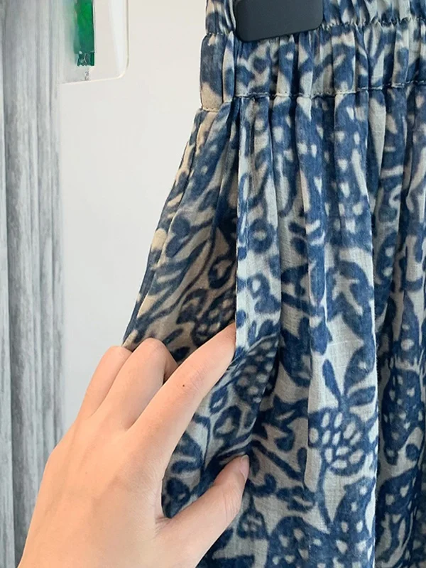 تنورة نسائية صيفية بخصر عالٍ وقصة A-Line، مطبوعة، مقاس كبير، فضفاضة، من القطن والكتان، بخصر برباط، تُساعد على إخفاء عيوب الجس...