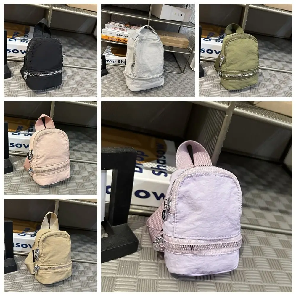 Simpatica mini zaino in nylon tinta unita, mini borsa a tracolla, portafoglio piccolo, borsa da appendere in stile coreano