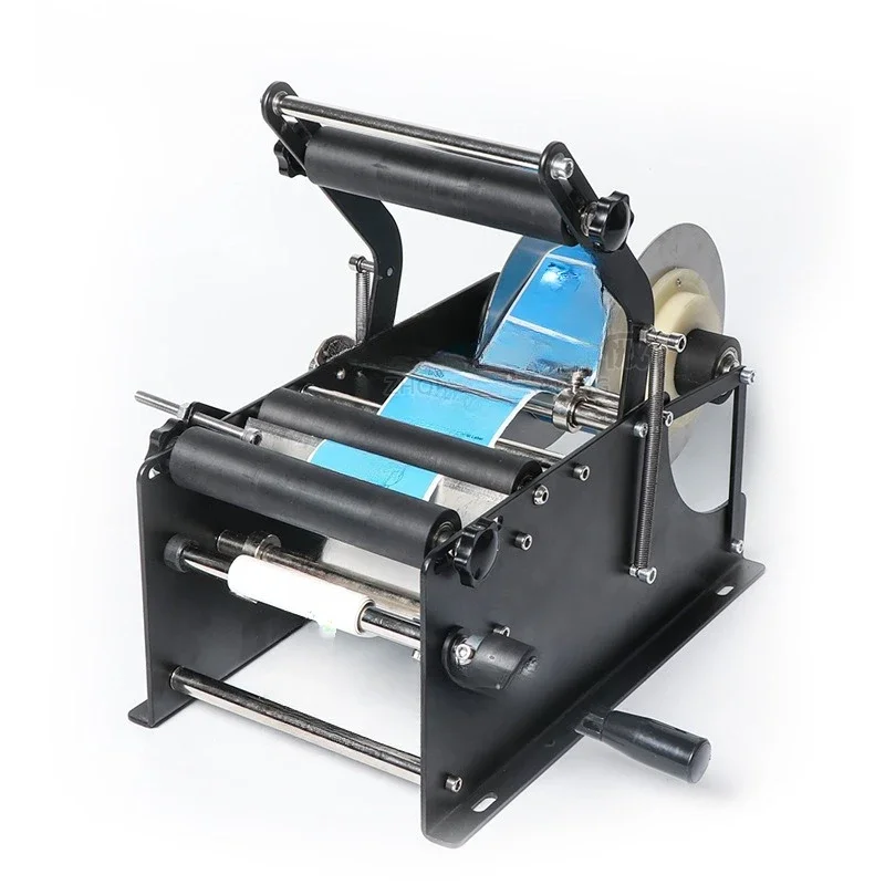 Manual with downward pressure round bottle labeling machine, self-adhesive label packaging machine, transparent