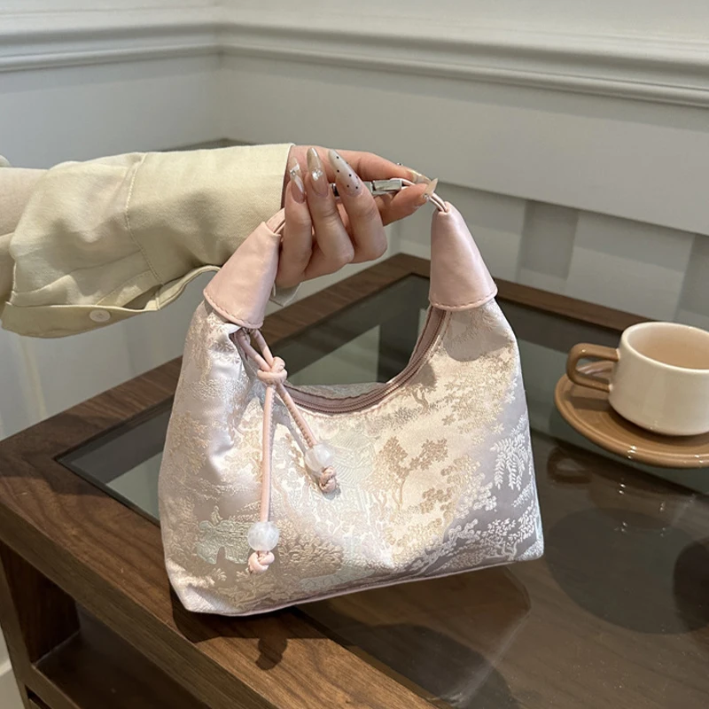 

New Chinese style Exquisite embroidery bag female new summer commuter messenger bag niche ancient style portable bucket bag