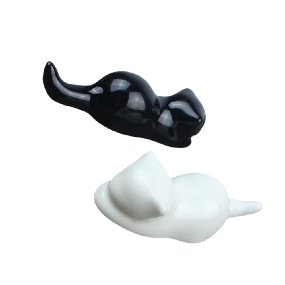 

2Pcs Ceramic Cat Shaped Pen Holder Black White Pen Brush Rest Glossy Surface Table Decoration Lovely Paperweight