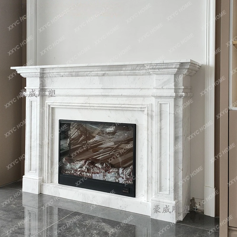 

Декоративный каминный портал из натурального белого камня ML Marble, резной, для декоративного обогрева, с декоративным шкафом.
