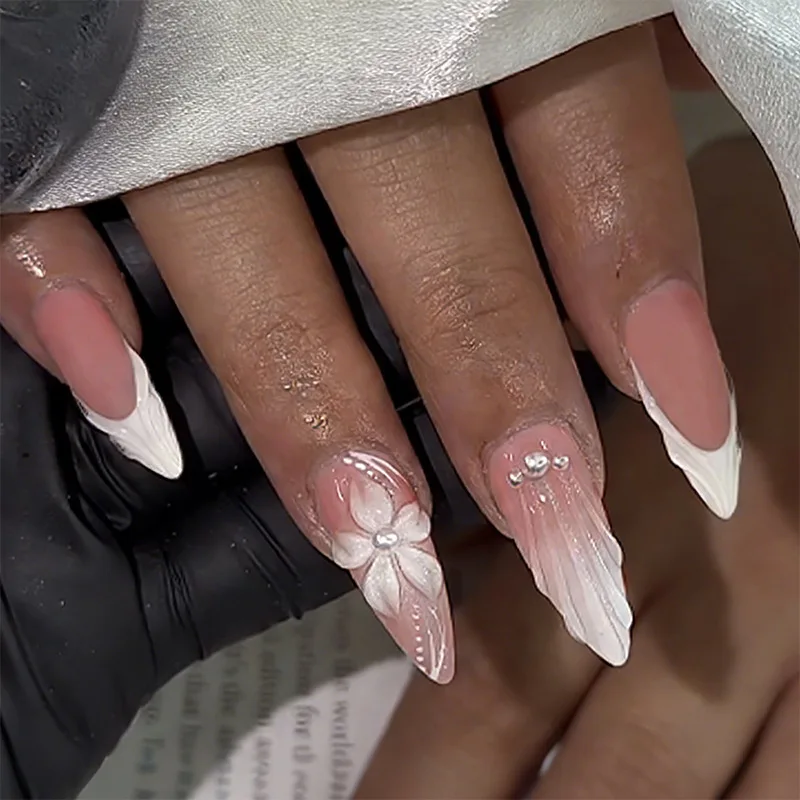 

24PCS Nude Pink Stiletto Fake Nails with 3D White Flower Wing Pearl Press on Nails Elegant Sweet Cool Bridal Nail Art for Women